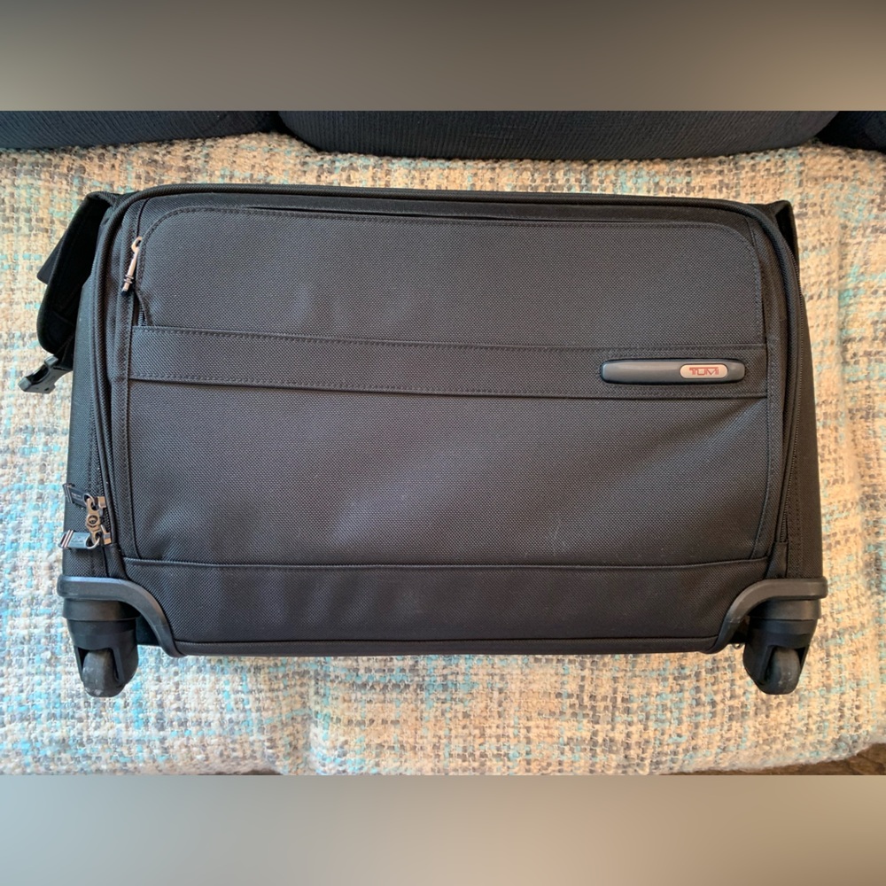 TUMI SUITCASE